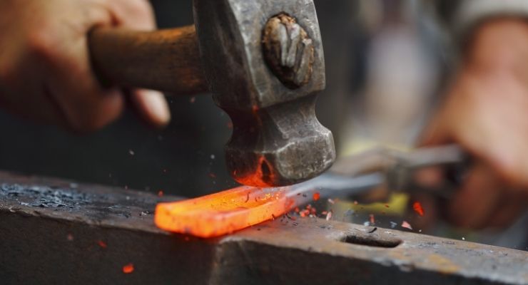 Forging using a hammer